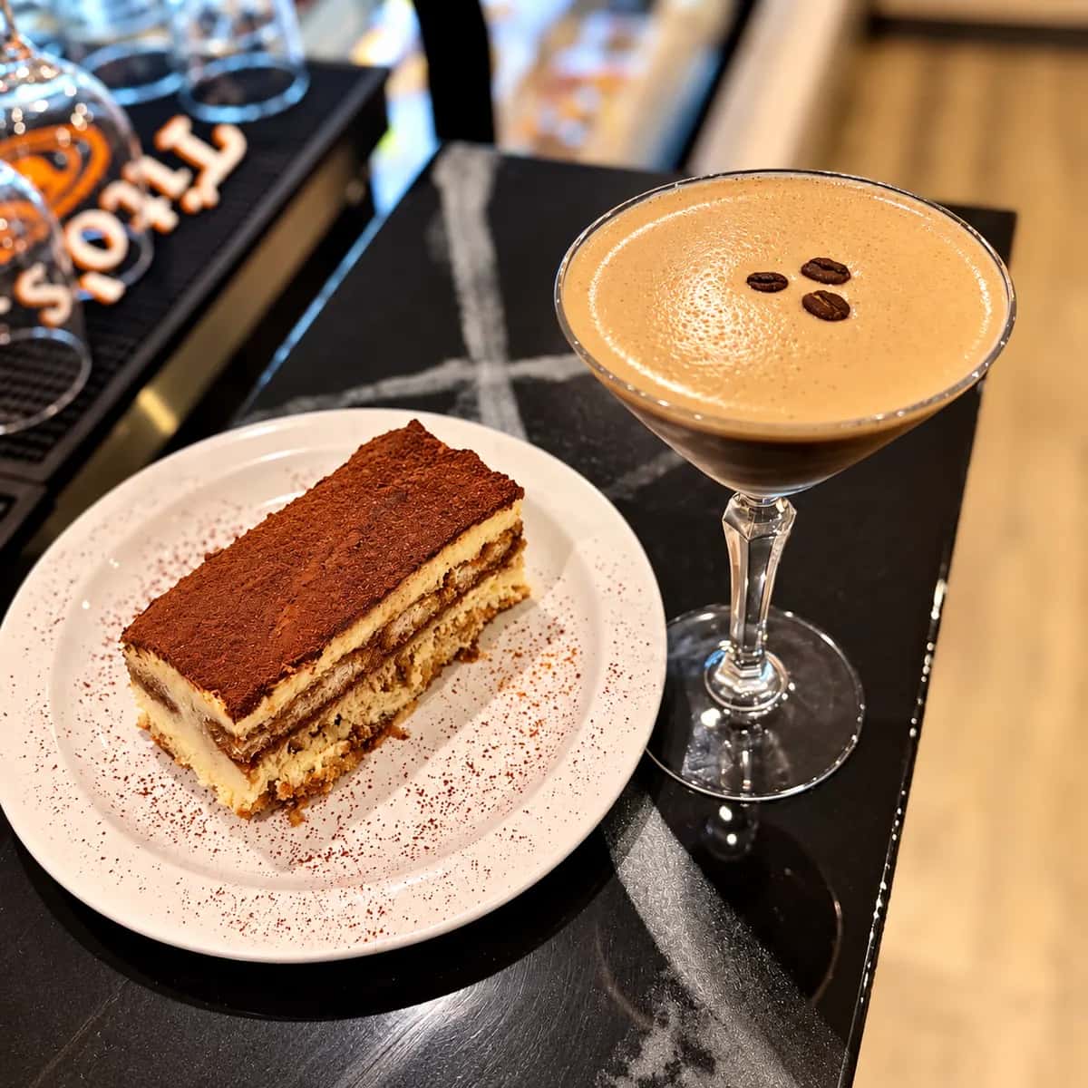 Espresso martini served with tiramisu at Lions Den Coffee Shop.